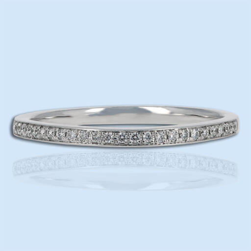 This 14k white gold wedding band features prong-set round brilliant cut diamonds that have a total approximate weight of .13ct. You will get best Diamond engagement ring in Fayetteville from Bopies jewelers at an affordable price. 
https://www.bopies.com/product/white-gold-diamond-wedding-band/