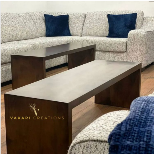 Elevate the ambiance of your living room with our exquisite collection of custom-made waterfall walnut-stained coffee tables. Crafted with precision and attention to detail, these stunning pieces are designed to be the centerpiece of your decor, combining functionality with timeless beauty.