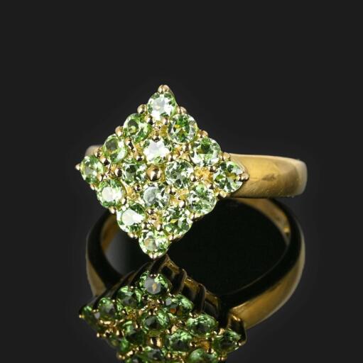 Vibrant tsavorite green garnet ring crafted in rich 10K yellow gold. Each open-back tsavorite is set in a raised gallery with the thick band graduating to the back.
https://www.youtube.com/shorts/7ny1CfQw1AQ
The color of the stones is a wonderful vivid green. Perfect for stacking or making a statement. Timeless, traditional elegance.

https://boylerpf.com/products/vintage-gold-tsavorite-green-garnet-ring