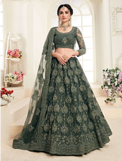 Ethnic Plus Presents Wedding Wear Mehendi Green colored Lehenga in net with silk satin 2 layer inner embellished with coding emboidery and stone work comes with heavy can can in it .
Paired with similar color Choli in net with silk satin inner and net dupatta with embroidery and cut work at edged . 
This lehenga is semi stitched can be customize up to 44 size.
Unstitched Blouse can be customized up to 46 inch size and 16 inch length and featured with Round neck and full sleeve .

₹9,349.00


https://www.ethnicplus.in/bridal-lehenga-choli/mehendi-green-coding-work-embroidered-net-bridal-lehenga-choli