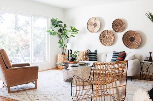 You can see this living room decorated with wooden pallets. It is spreading the natural vibe in the space. The interior designers have fitted a sofa, two chairs and cushions that match the living room decor. Visit the website to know more.
https://kreatecube.com/design/living-room/luxury-living-room-design/14728
