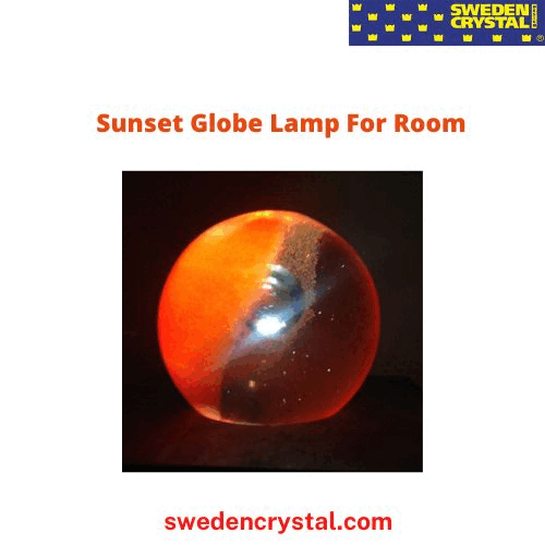 Find the exclusive Sunset globe lamp for room showcasing a 3D three-dimensional light, wherein the light glow through the optical effects, when the light passes from below into the huge optical crystal striking the sun at its center. For more details, visit: https://swedencrystal.com/sunset-globe-lamp/