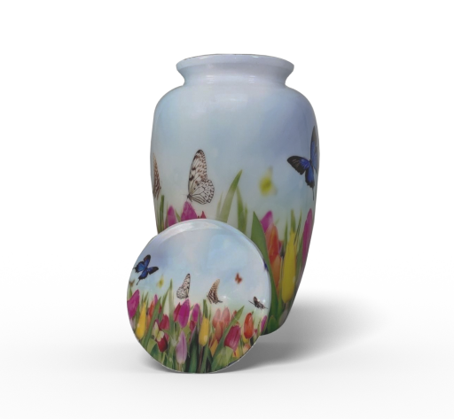 This urn for ashes is handmade from high-quality alloys and features a lovely enamel-coated finish with a floral garden motif.

https://ashescremationurn.com.au/products/beundre-adult-ashes-urn