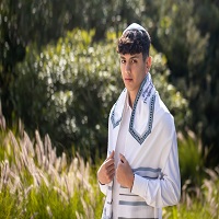 Probably the easiest option for you was to reach the online shop of Galilee Silks- the leading designer and manufacturer of Jewish prayer shawls for Bar Mitzvah, Bat Mitzvah, wedding and every special occasion in the Jewish culture.   For more visit: 
https://www.galileesilks.com/