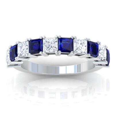 Eternity band for women with a half-eternity diamond. This half-eternity band with blue sapphires and diamonds weighs 0.93 gm and 1.38 carats and has six beautiful sapphire gemstones lined up in a row. This stunning item, a rare masterpiece from New York, USA, is made of 14K white, rose, or yellow gold and white 950 platinum and has combination stones of diamonds and blue sapphires.

Shop now at -https://www.gemsny.com/eternity-band/Half-Eternity-Diamond-And-Blue-Sapphire-Square-Four-Prong-Band-2.31cttw-EB74646BS/?Metal_Type=34
