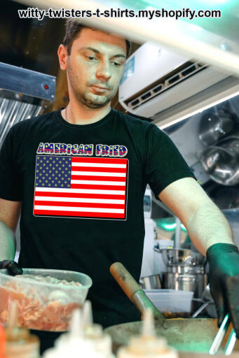 American Fried is about Americans that smoke or consume cannabis and then get fried, not fried foods. Now marijuana activists, recreational pot smokers, and medical marijuana users can unite with American pride after they get fried. Wear this funny stoner t-shirt to 420 festivals and spread some cannabis comedy amongst your fellow stoners.

Buy this funny weed-smoking stoner's t-shirt with a United States flag for cannabis users here:

https://witty-twisters-t-shirts.myshopify.com/products/american-fried-1