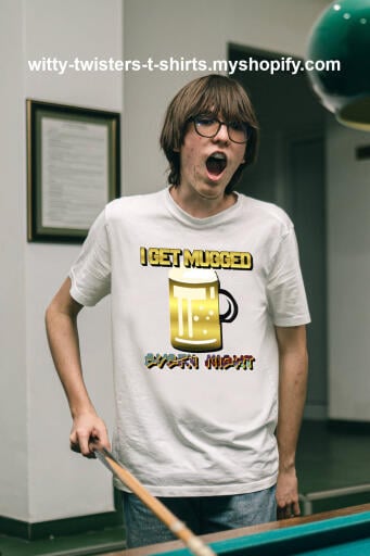 Getting mugged means being assaulted for your stuff. On this funny drinkers t-shirt, it's when you get mugged every night because you're drinking mugs of beer. If you like to drink beer in bars or out of mugs at home or drink beer at all, you can wear this funny beer-drinking t-shirt and get mugged every night. A great gift for college students that are drinking instead of thinking.

Buy this funny beer drinkers t-shirt here:

https://witty-twisters-t-shirts.myshopify.com/products/i-get-mugged-every-night