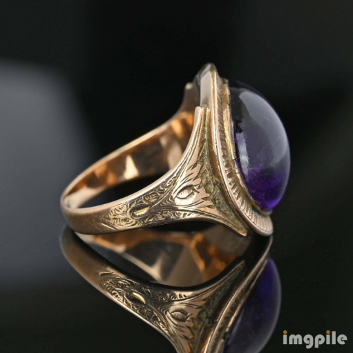 Behold this stunning antique jewelry, a 10K gold Georgian amethyst ring, dating back to circa 1796, sold at <a href="https://boylerpf.com">Boylerpf</a>. The central faceted foil-backed purple amethyst cabochon is encased in a ribbed gold frame and engraved shoulders, gracefully curving around the finger. Engraved on the back is the inscription 'Elizabeth Worthington Ob 5 April 1796 alt 53', adding a touch of history to the already exquisite design. The stunning gemstone, set against the vibrant yellow gold, glitters with a timeless charm, making this an impressive memorial ring with over 225 years of rich history.

#antiqueJewelry #amethystring #AntiqueGeorgianRing #circa1796 #10Kgoldring #AntiqueRing